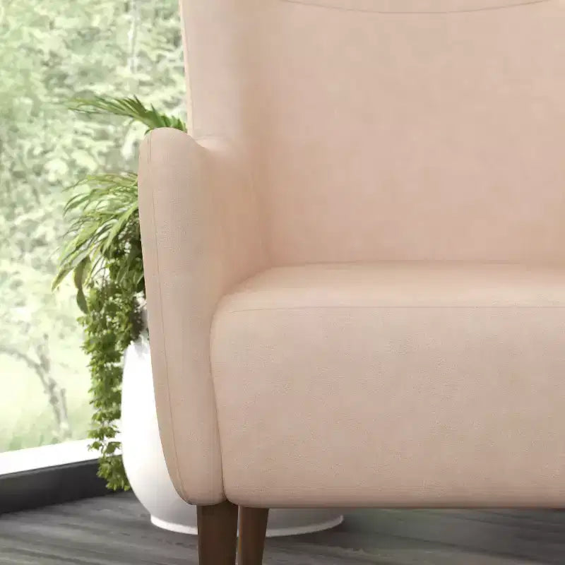 Poltrona classica Wingback, rivestimento in similpelle, struttura e gambe in legno, portata 136 kg