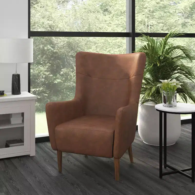 Poltrona classica Wingback, rivestimento in similpelle, struttura e gambe in legno, portata 136 kg