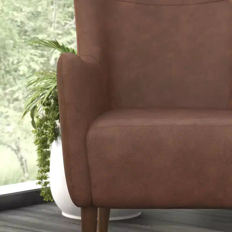 Poltrona classica Wingback, rivestimento in similpelle, struttura e gambe in legno, portata 136 kg
